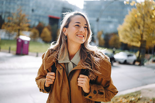 istock Cheerful woman enjoying exploring the city 2246483278