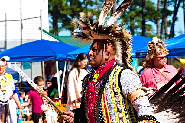 Bolton, NC  October 18, 2025: A Native American man in ceremonial dress at the 2025 Waccamaw Siouan Pow Wow in a celebration of native culture and heritage.