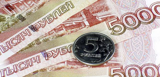 istock stack of money bond and coin 2246493482
