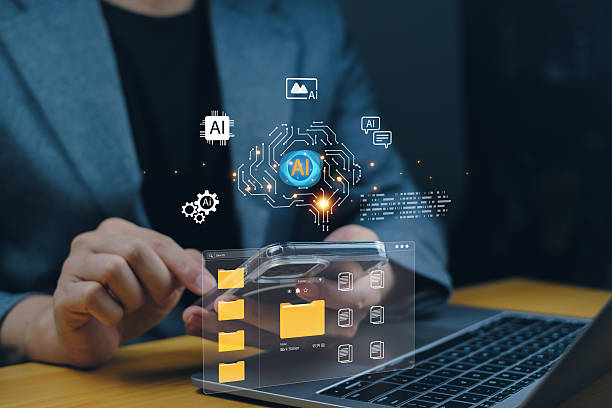 istock AI data management, file technology, automation, and digital system in action. Businessman using smartphone and laptop to access smart file folders with AI icons in modern workspace. 2246493878
