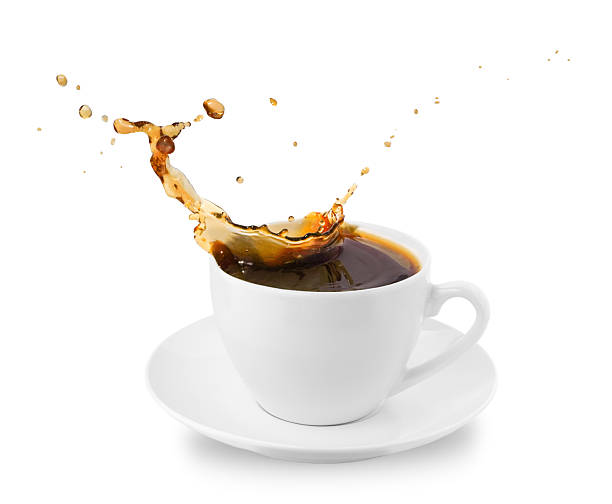 istock Dynamic splash of coffee in white porcelain cup isolated on white background. 2246495252