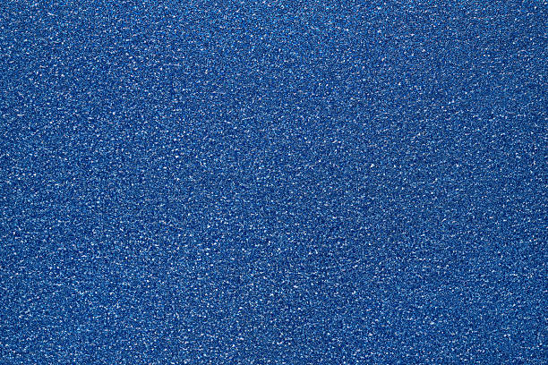 istock Blue glitter textured paper showing gleaming particles, suitable for festive, celebration, or luxurious concepts 2246504301