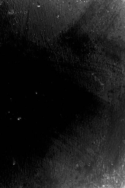 istock Vintage Film Texture: Abstract Dark Black Grungy Background Texture with Scratches, Dust Specks, and Heavy Grain. Cinematic Overlay 2246504390