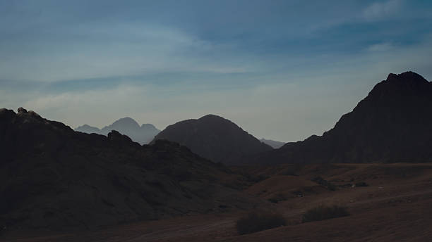 istock rocky mountains and desert landscape and sunset sky in Egypt 2246507875