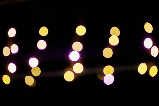 istock Yellow and golden dotted blurred lights 2246510611
