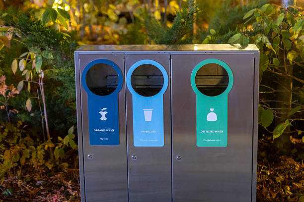 istock Modern glossy metal trash can. Waste sorting. Green concept. 2246513920