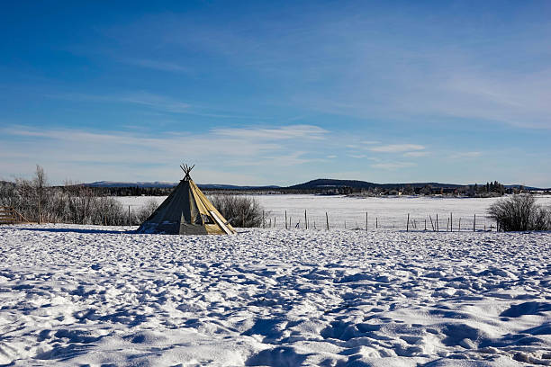 A traditional Sami tent in a field of snow near Kiruna, Sweden