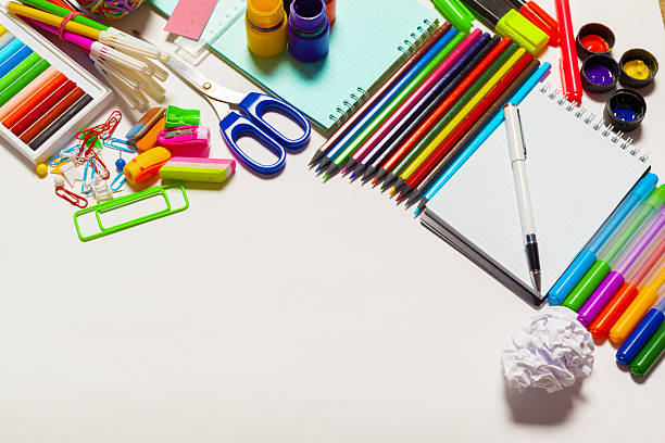 istock Colorful stationery supplies arranged on a creative workspace ready for crafting 2246522553
