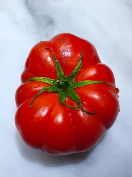 Close Up Shot Of A Fresh Red Tomato