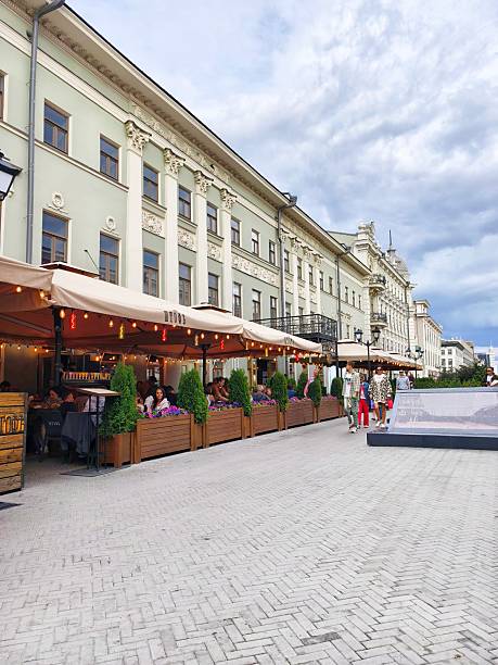 Kazan Kremlin,Kazan, Russia:July 26,2024: The Bauman Street (Kazan arbat),the main pedestrian street in Kazan,a long, straight pedestrian walkway, paved with patterned light-colored bricks. Traditional-style streetlights line the path