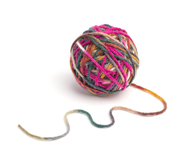 istock Ball of yarn on white background 2246537639