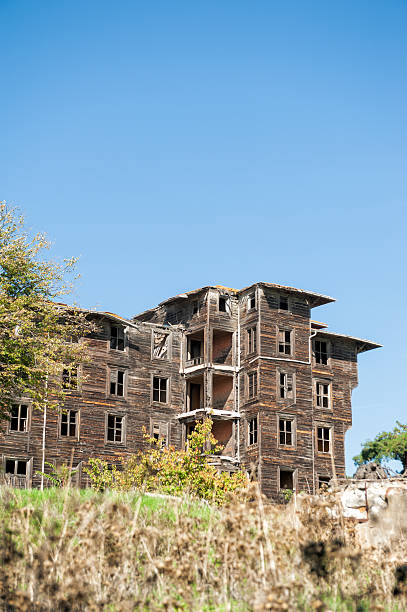 istock Abandoned wooden building with weathered facade 2246538619