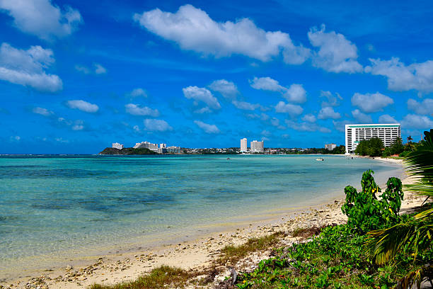 Hagåtña Bay, named after the capital city of Hagåtña (also known as Agana), encompasses one of the island's largest accessible beaches, Agana Bay Beach and further north Trinchera and Dungcas beaches, ending in Tamuning, all beaches offering thin golden sands facing a shallow reef lagoon ideal for fishing and water sports.