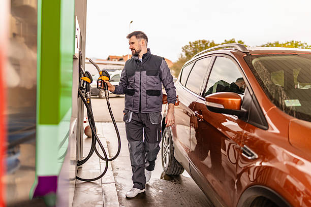 istock Refueling a car at a gas station during a cloudy day 2246543507