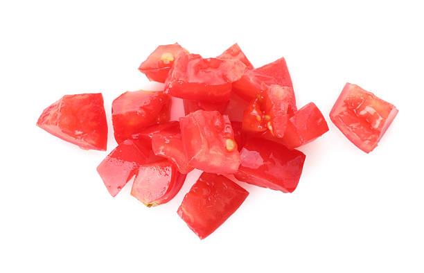 istock Pieces of ripe red tomatoes isolated on white, top view 2246543631