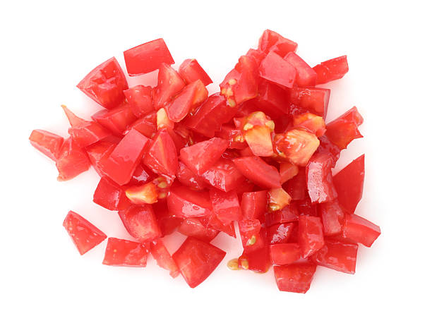 istock Pieces of ripe red tomatoes isolated on white, top view 2246543686
