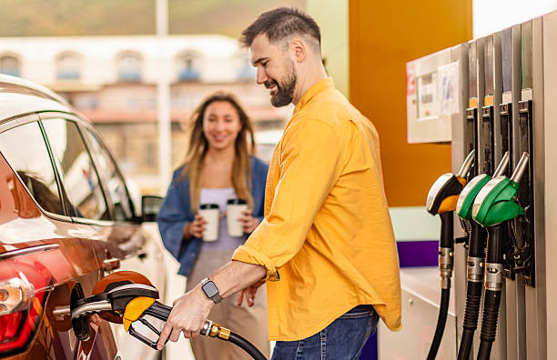 istock Refueling at a busy gas station with friendly interactions between customers 2246545881
