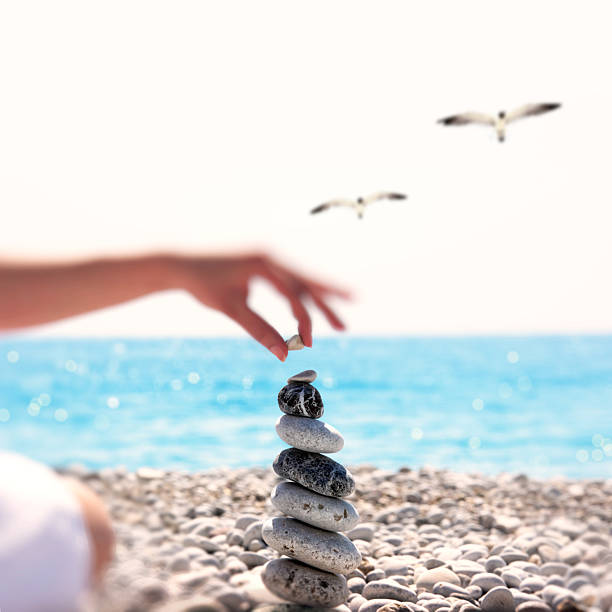 Balanced stones on beach