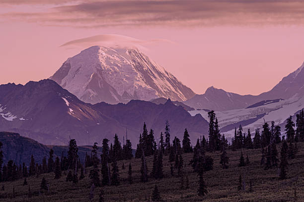 istock Denali peak capped with lenticular cloud at sunset. 2246555968