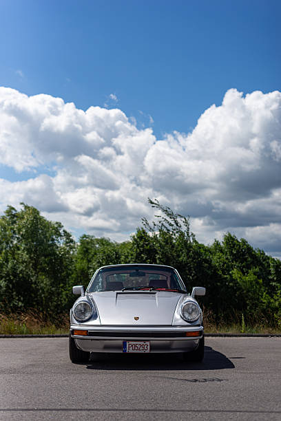 Vilnius, Lithuania - June 20, 2024: Classic Porsche 911SC (G-model) parked at the side of the road. After full restoration, painted in smart silver colour, with period correct RUF wheels.