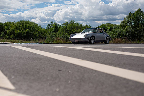 Hamburg / Germany - September 28, 2018: Porsche 911 stands on parking lot near the Airport Hamburg
