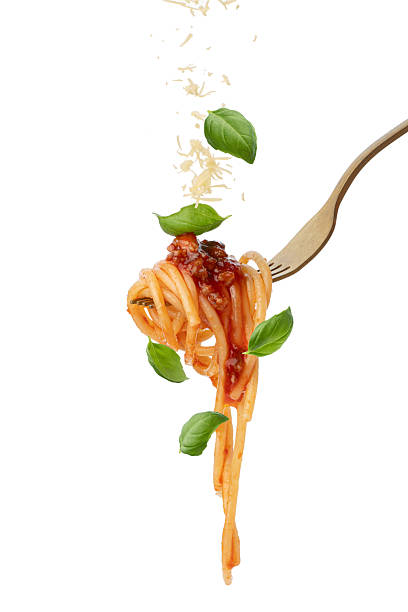 istock Fork with pasta pasta, basil and cheese in a white, isolated background 2246561333