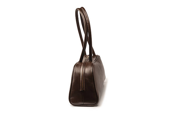 istock Bowling browm leather bag isolated on a white background. 2246562992