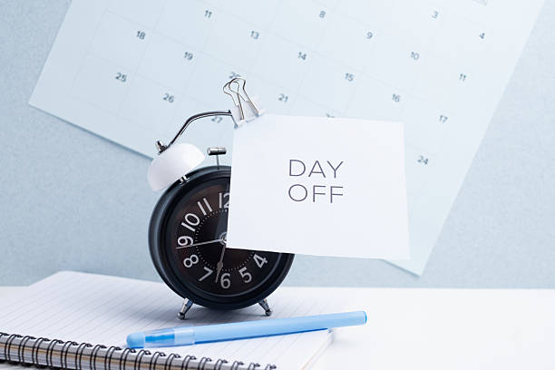 istock Day off - workplace message in the office. Concept of absence from work and day off 2246563342