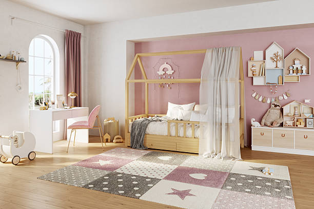 istock Modern Children's Bedroom with Pink Accent Wall and House Bed 2246568285
