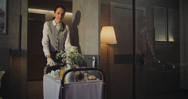 istock Professional Hotel Employee Delivering Room Service in Upscale Accommodation 2246570633