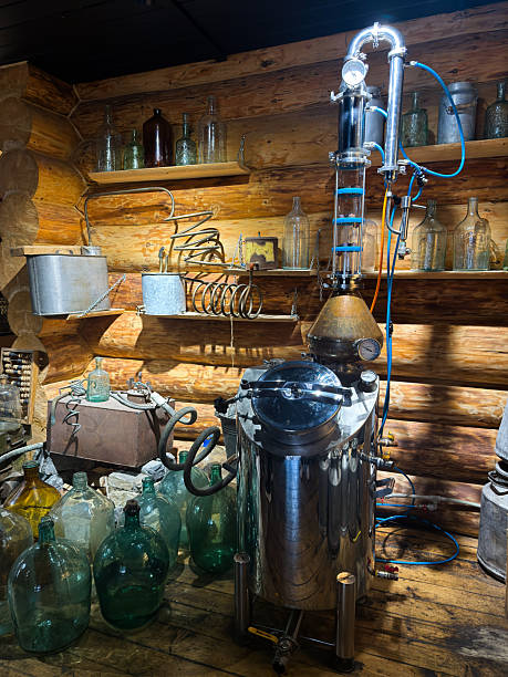 istock Vintage craft distilling, heritage distillery environment featuring antique equipment and warm lighting 2246574858