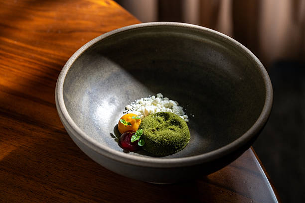 Fine dining plating a gourmet matcha dessert with molecular gastronomy