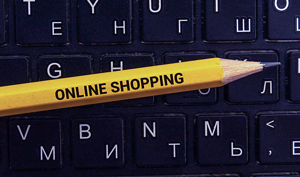 istock words Online Shopping. note pasted on the laptop screen 2246578854