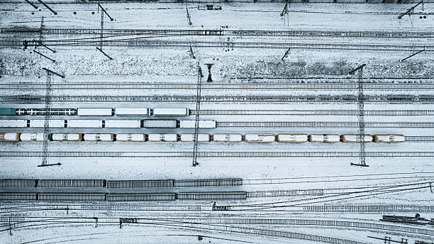 istock Overhead shot of a snowy railway yard featuring freight trains on multiple tracks, Vilnius, Lithuania 2246584807
