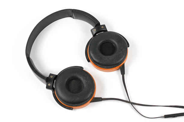 Vintage Wired Headphone Device Audio Equipment on White Background