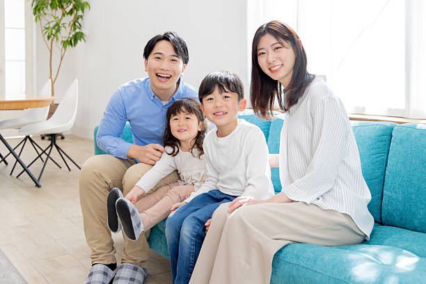 istock Relaxed living room with family 2246590700