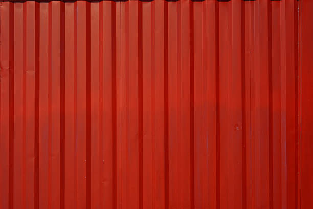 istock Vibrant red corrugated metal sheet with vertical stripes 2246594461