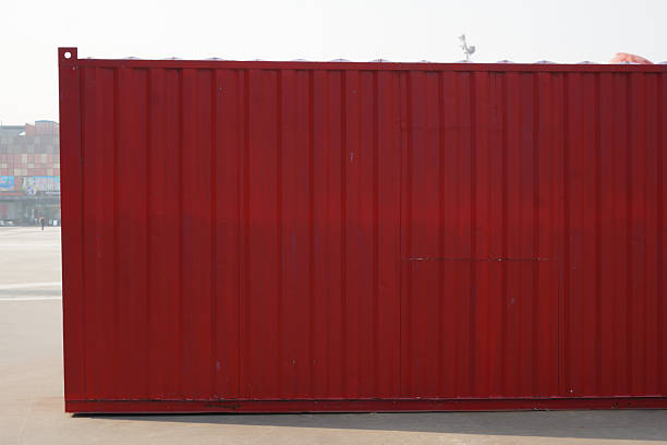 istock Red metal container with vertical panels for storage or transport 2246594467