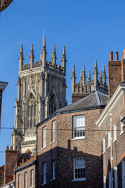 istock Gothic Tower Behind Brick Buildings in York, UK. 2246595051