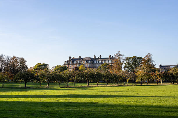 istock Building behind autumn trees and green lawn in Harrogate, UK. 2246595124