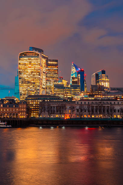 istock London skyline reflecting on the thames at dusk 2246598158