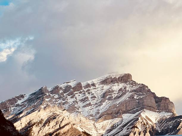 View of Cascade Mountain at sunset form downtown Banff at the Golden Hour.