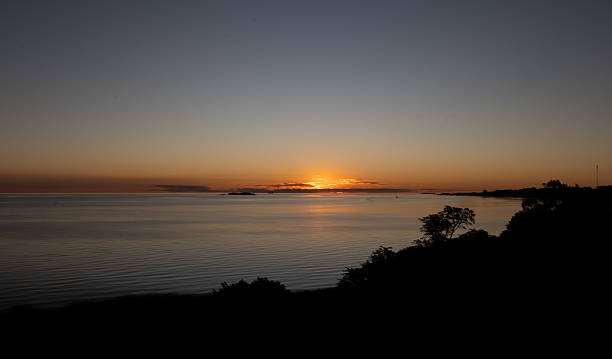istock beautiful orange sunset at Rio de la plata3 2246601068