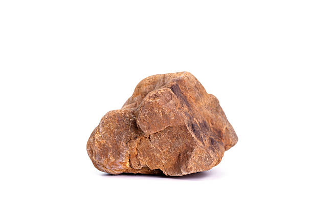 Natural rocks, black rough mountain rocks, red hard rocks for construction work on white background.