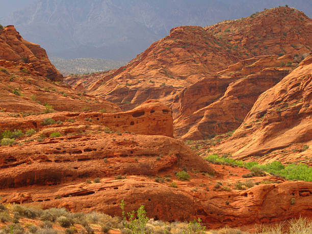 istock Red Rock Landscape with Hole Formations 2246609869