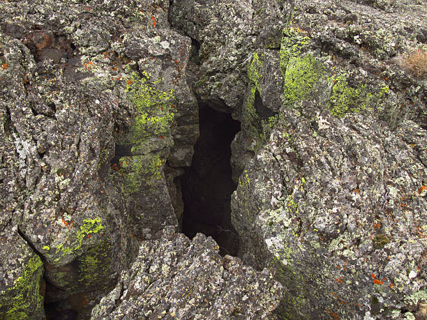 istock Volcanic Rock Cave with Lichen Close-up 2246609887