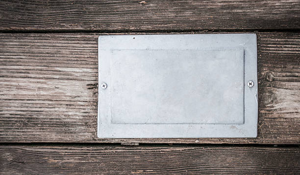 istock metal template on wood background 2246612976