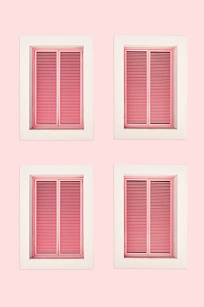 istock Pastel pink facade with four pink closed shuttered window in bright summer sunlight, tropical vacation mood. Travel blogs, resort branding, coastal lifestyle visuals. Minimal aesthetic pattern 2246616568