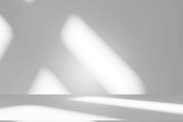 istock Wall interior background, studio and backdrops show products.with shadow from window color white . background for text insertion and presentation product 2246617491