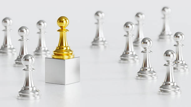 istock Golden Chess Pawn on Silver Block Symbolizing Excellence Leadership in Distinction Achievement Among Crowd 2246619574